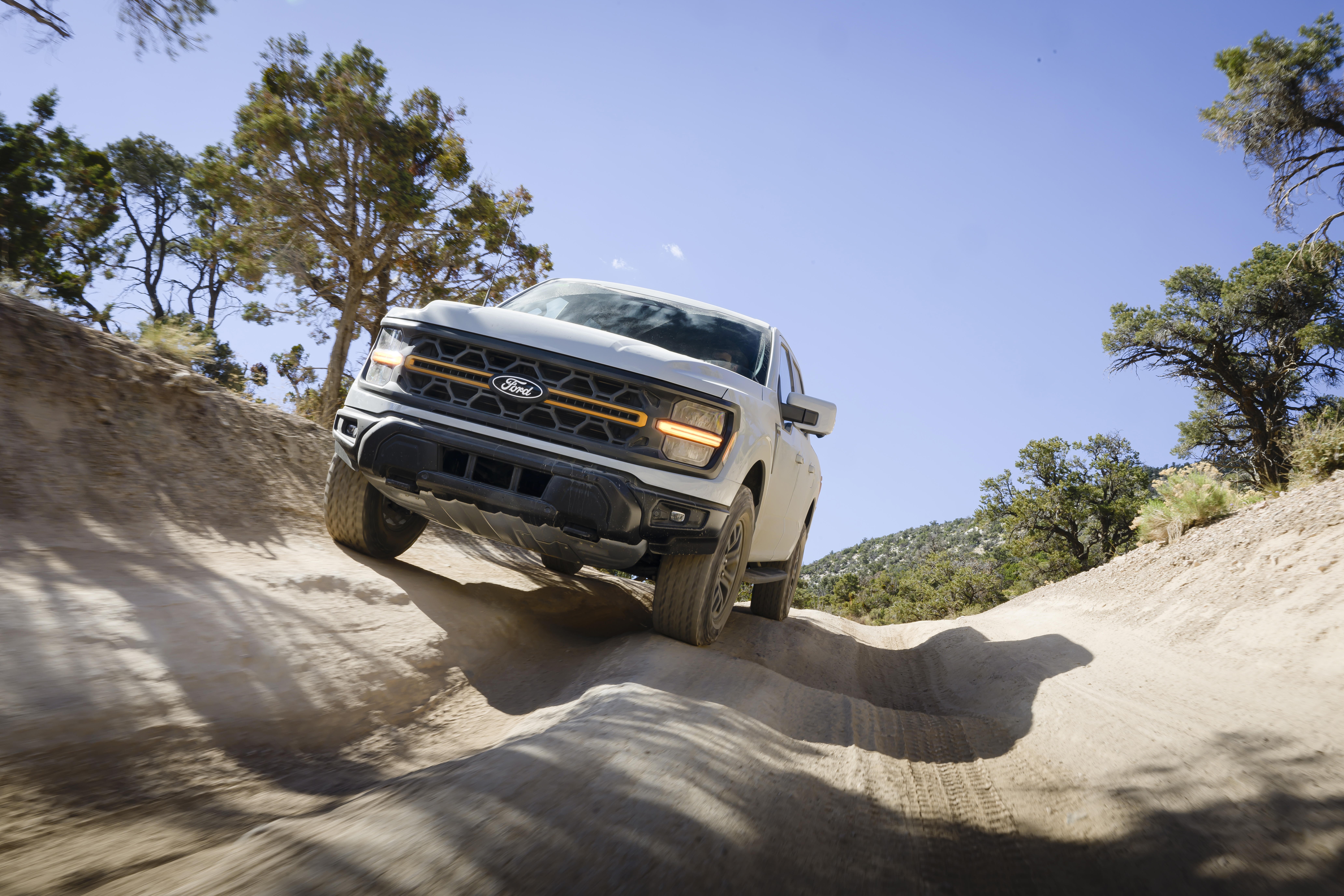 Professional driver on closed course. Always consult the Owner's Manual before off-road driving, know your terrain and trail difficult, and use appropriate safety gear.

